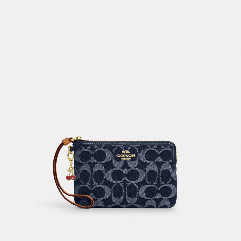 COACH®,Corner Zip Wristlet In Signature Denim,,Front View image number 0