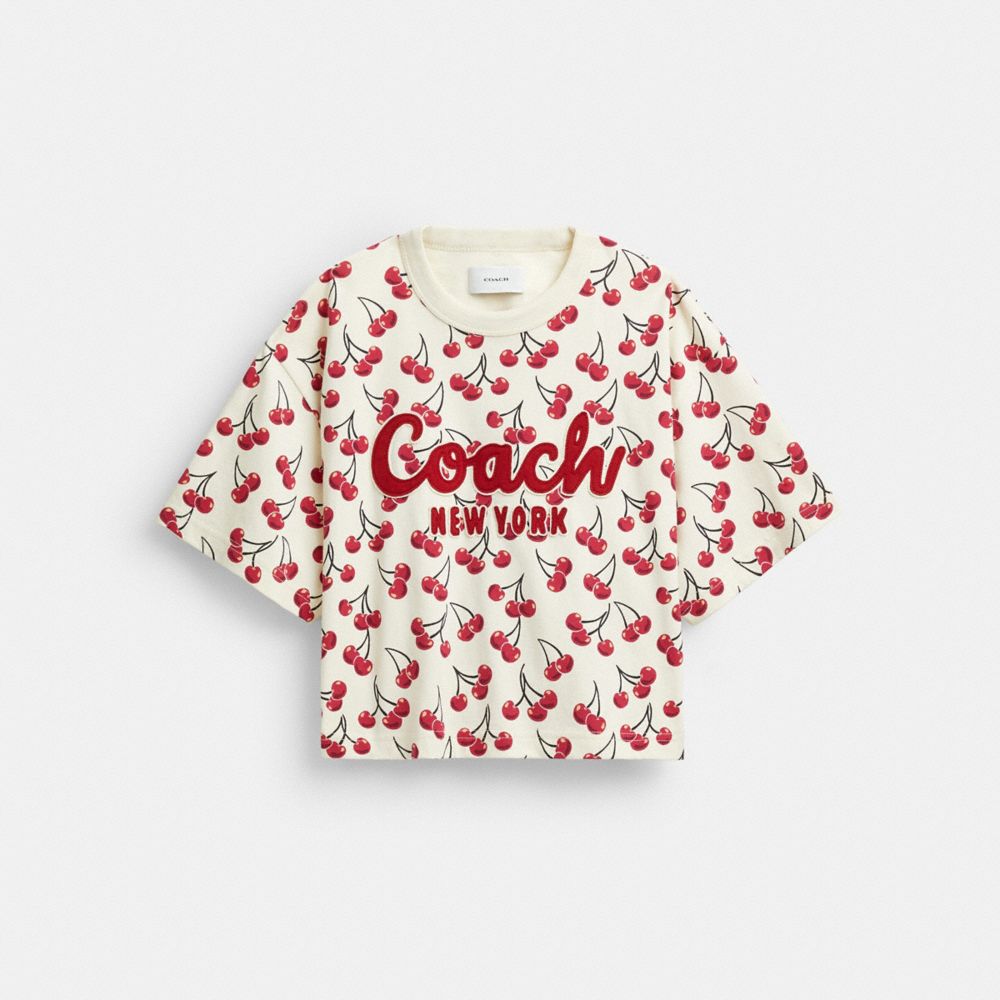 COACH®,Cherry Print Cursive Signature Cropped T Shirt In Organic Cotton,Organic Cotton,T Shirt,Sustainable,Casual,Cream,Front View image number 0