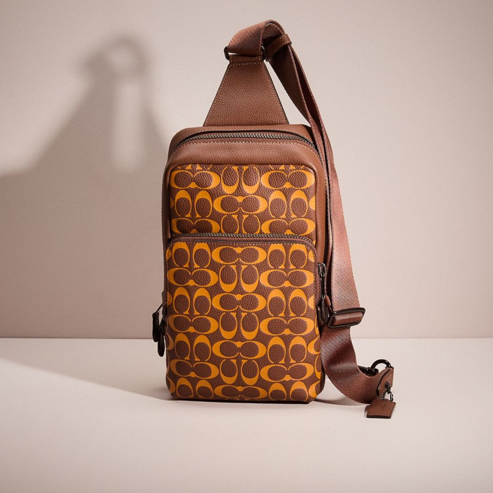 COACH®,RESTORED GOTHAM PACK IN SIGNATURE LEATHER,Saddle/Papaya,Front View