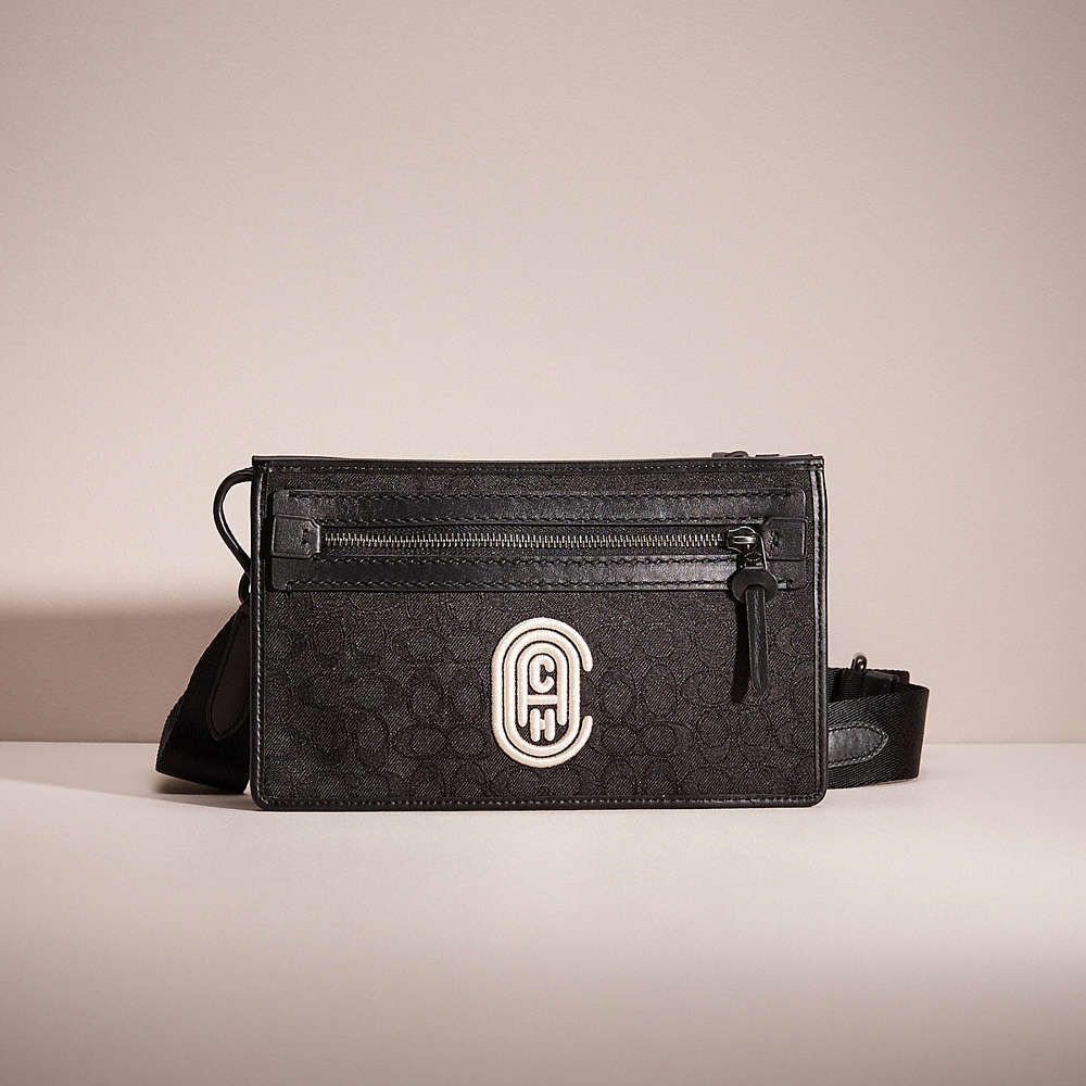 Shop Coach Restored Rivington Convertible Pouch In Signature Jacquard With  Patch In Black/chalk