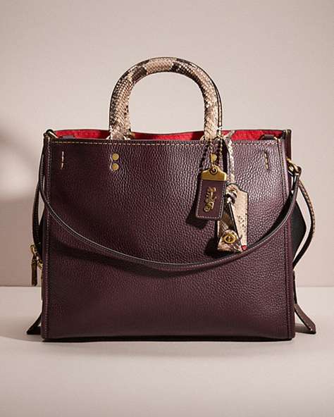 COACH®,RESTORED ROGUE IN COLORBLOCK WITH SNAKESKIN DETAIL,Brass/Oxblood Multi,Front View
