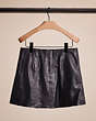 COACH®,UPCRAFTED HERITAGE C LEATHER MINI SKIRT,Sweet Nostalgia,Black,Back View