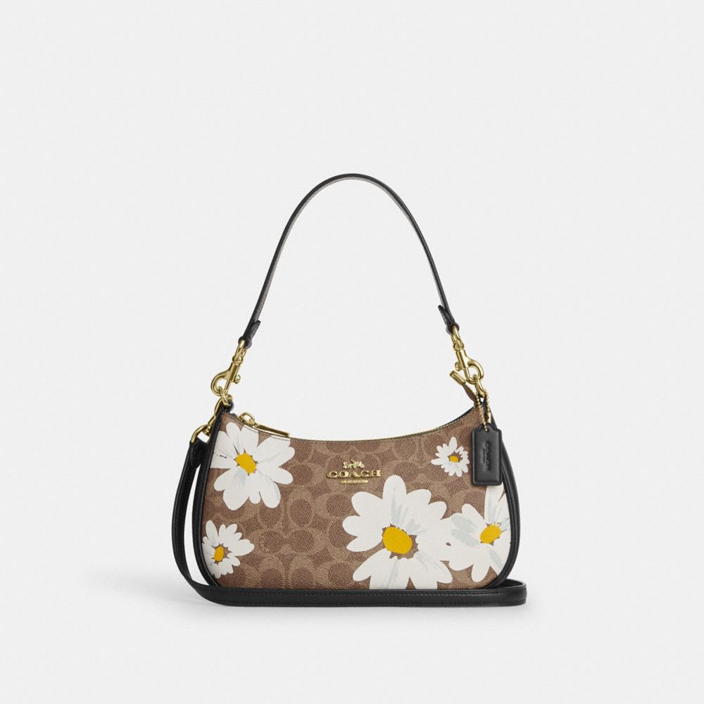 Coach bag flower print sale