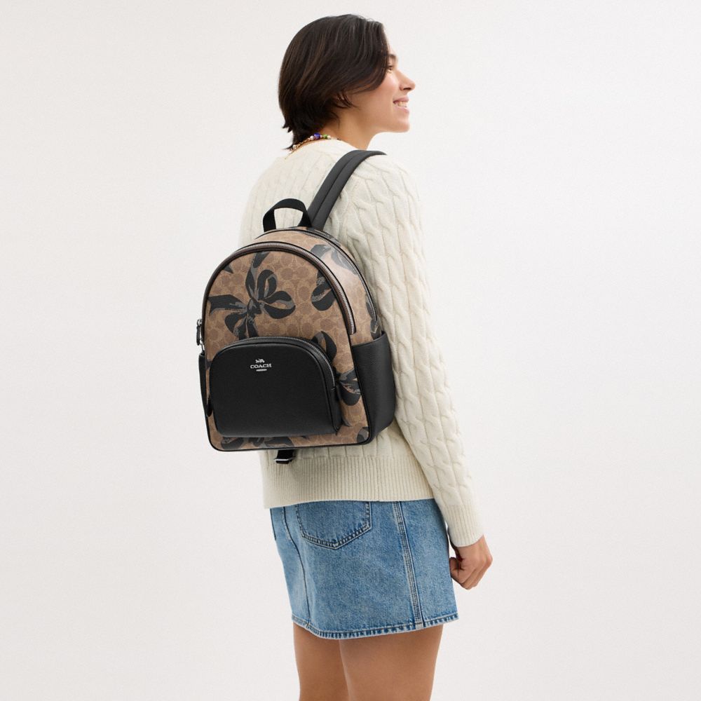 COACH®,Court Backpack In Signature Canvas With Bow Print,,Detail View