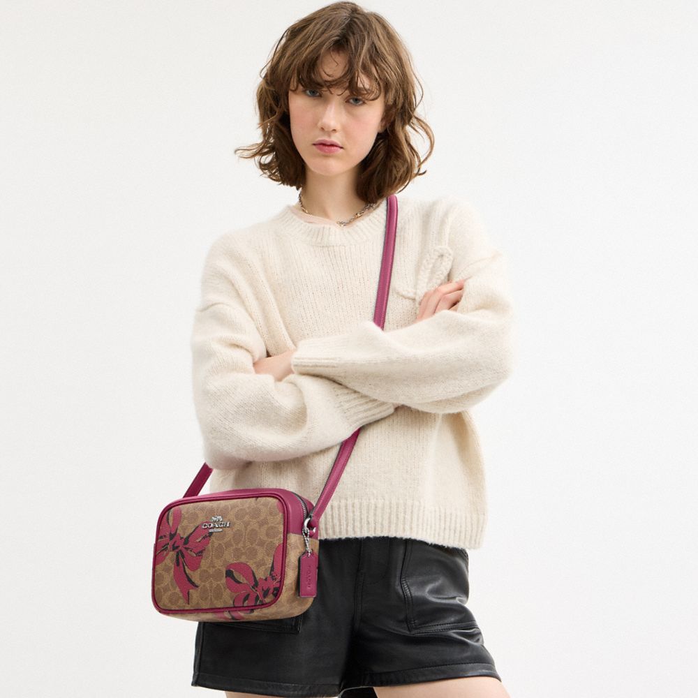 COACH®,Jamie Camera Bag In Signature Canvas With Bow Print,,Detail View