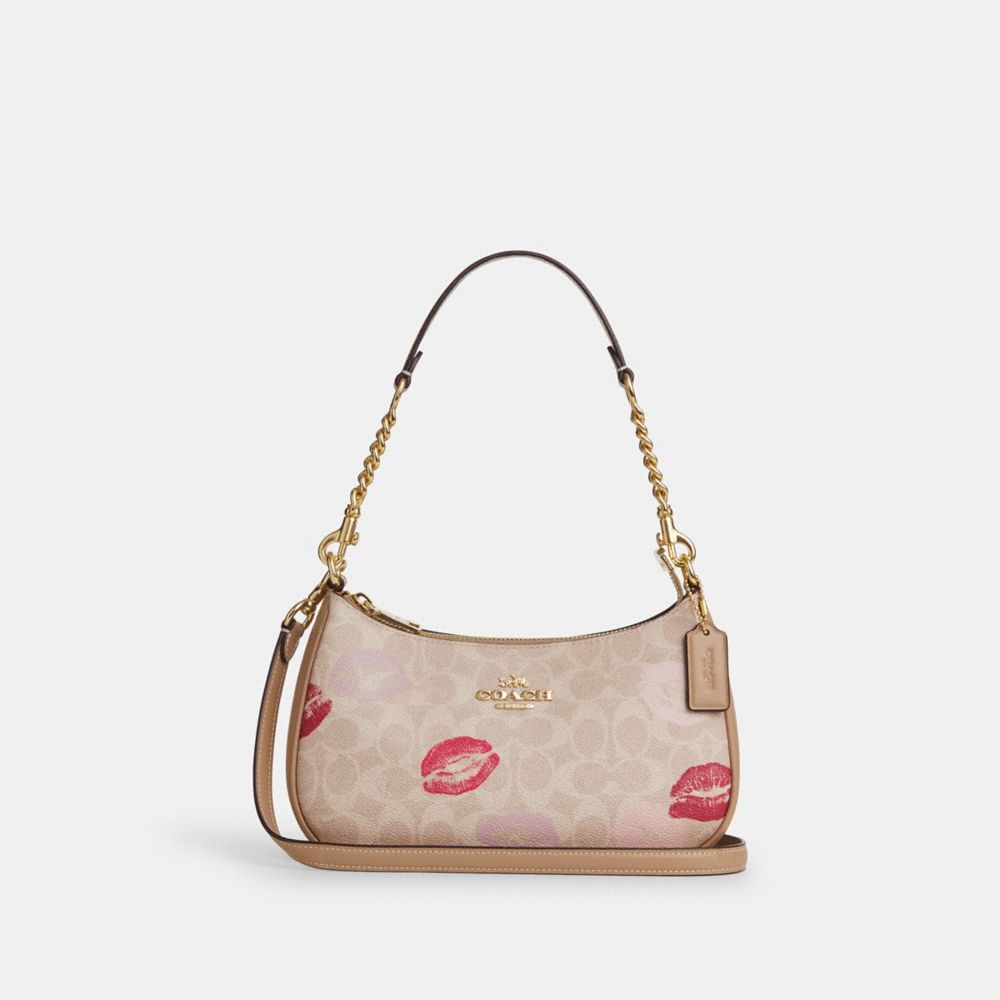 COACH®,Teri Shoulder Bag In Signature Canvas With Lips Print,Beige,Front View