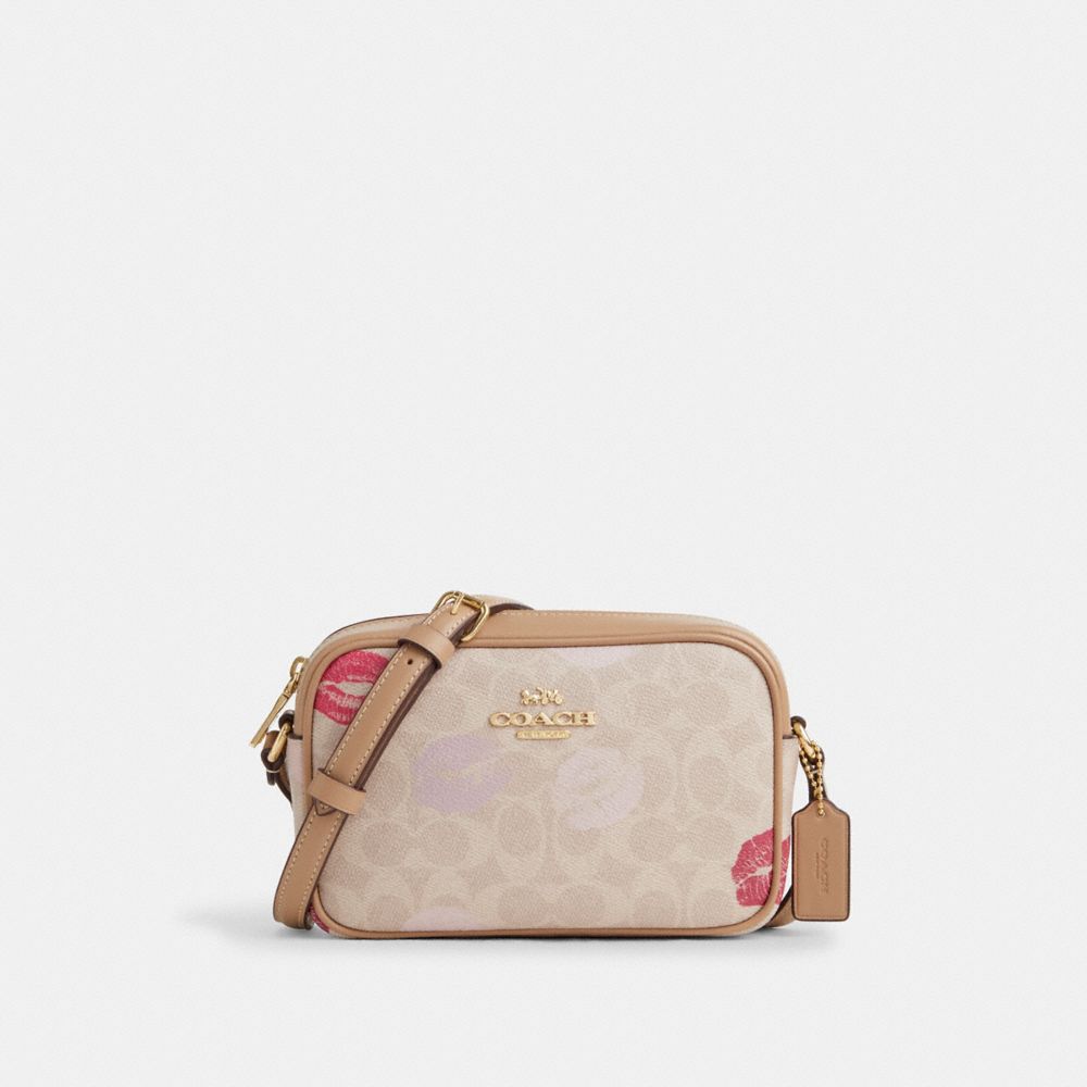 COACH®,MINI SAC POUR APPAREIL PHOTO JAMIE EN TOILE SIGNATURE AVEC IMPRIMÉ LÈVRES,Toile exclusive,Multicolore or/sable,Front View