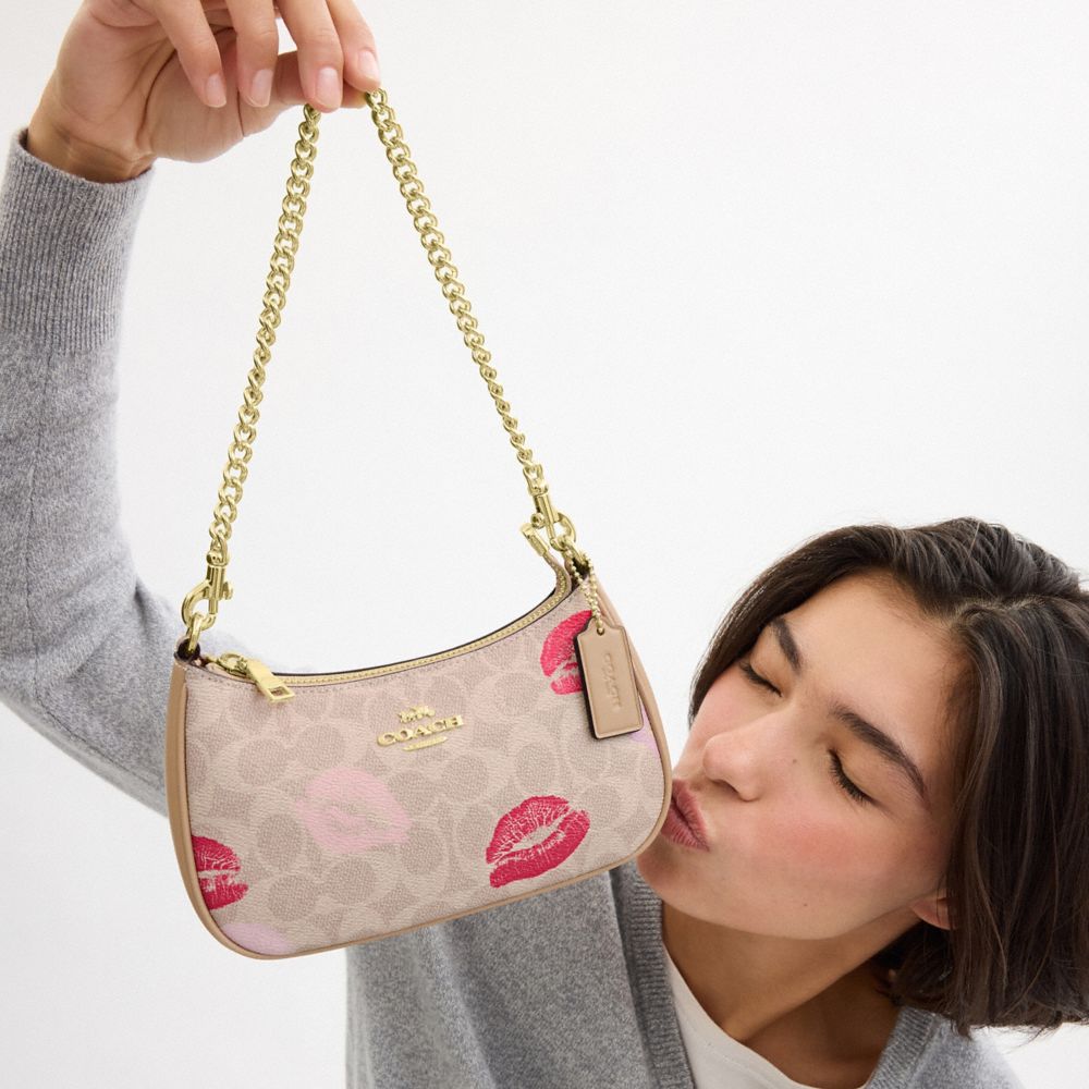 COACH®,Teri Mini Crossbody Bag In Signature Canvas With Lips Print,Beige,Detail View