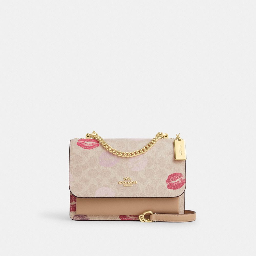 COACH Outlet Klare Crossbody Bag In Signature Canvas With Lips Print