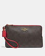 COACH®,DOUBLE ZIP WALLET IN SIGNATURE CANVAS,pvc,Gold/Brown True Red,Front View