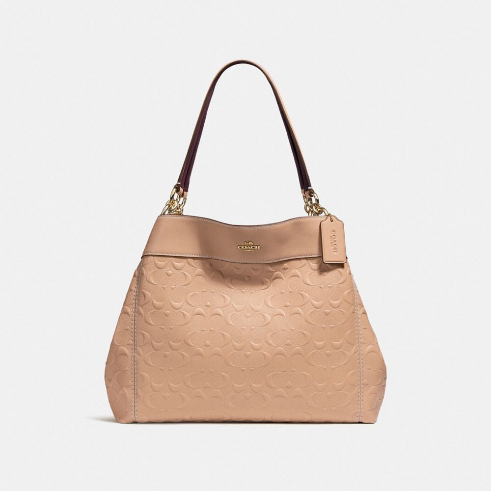 Coach lexy shoulder bag in signature sale