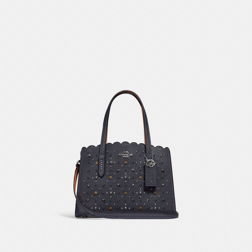 COACH Outlet Charlie Carryall 28 With Prairie Rivets