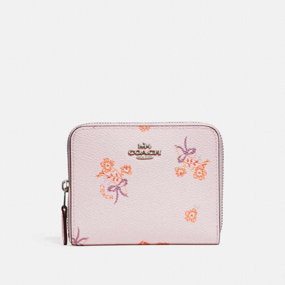 Petit portefeuille zippé avec imprimé floral à nœud