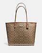 COACH®,REVERSIBLE CITY TOTE IN SIGNATURE CANVAS,pvc,Large,Gold/Khaki Saddle 2,Front View