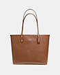 COACH®,REVERSIBLE CITY TOTE IN SIGNATURE CANVAS,pvc,Large,Gold/Khaki Saddle 2,Angle View