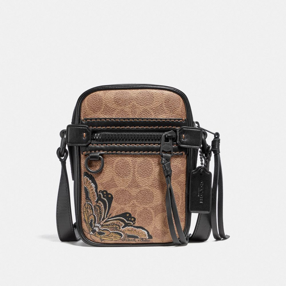COACH Outlet Dylan 10 In Signature Canvas With Tattoo