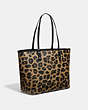 COACH®,REVERSIBLE CITY TOTE WITH LEOPARD PRINT,pvc,Large,Gold/Black Natural,Angle View