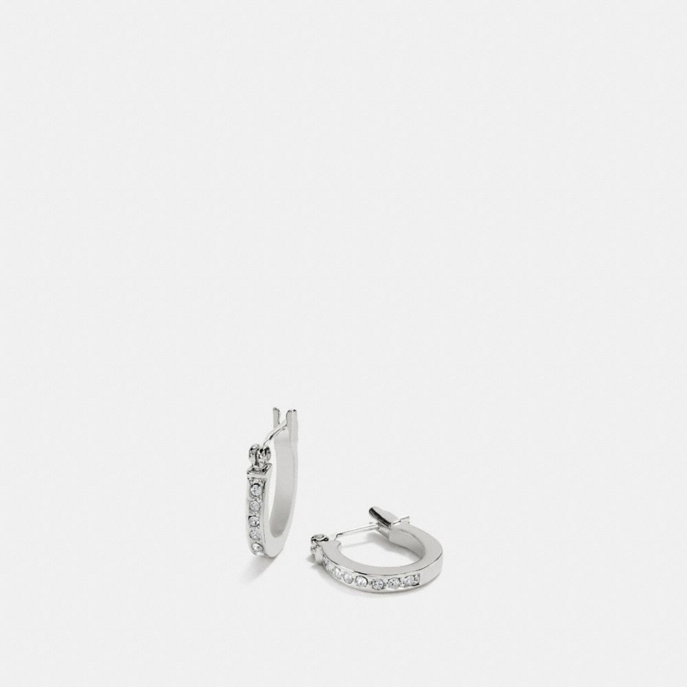 Coach pave signature huggie on sale earrings