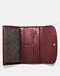 COACH®,CHECKBOOK WALLET IN SIGNATURE CANVAS,pvc,Gold/BROWN/WINE,Inside View,Top View