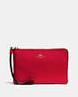 COACH®,CORNER ZIP WRISTLET,pusplitleather,Mini,Gold/Bright Red,Front View