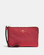 COACH®,CORNER ZIP WRISTLET,pusplitleather,Mini,Gold/Washed Red,Front View