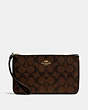 COACH®,LARGE WRISTLET IN SIGNATURE CANVAS,Gold/Brown Black,Front View