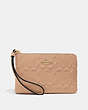 COACH®,CORNER ZIP WRISTLET IN SIGNATURE LEATHER,Leather,Mini,Gold/BEECHWOOD,Front View