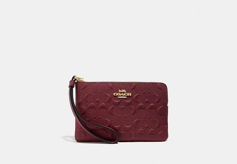 COACH®,CORNER ZIP WRISTLET IN SIGNATURE LEATHER,Leather,Mini,Gold/Wine,Front View