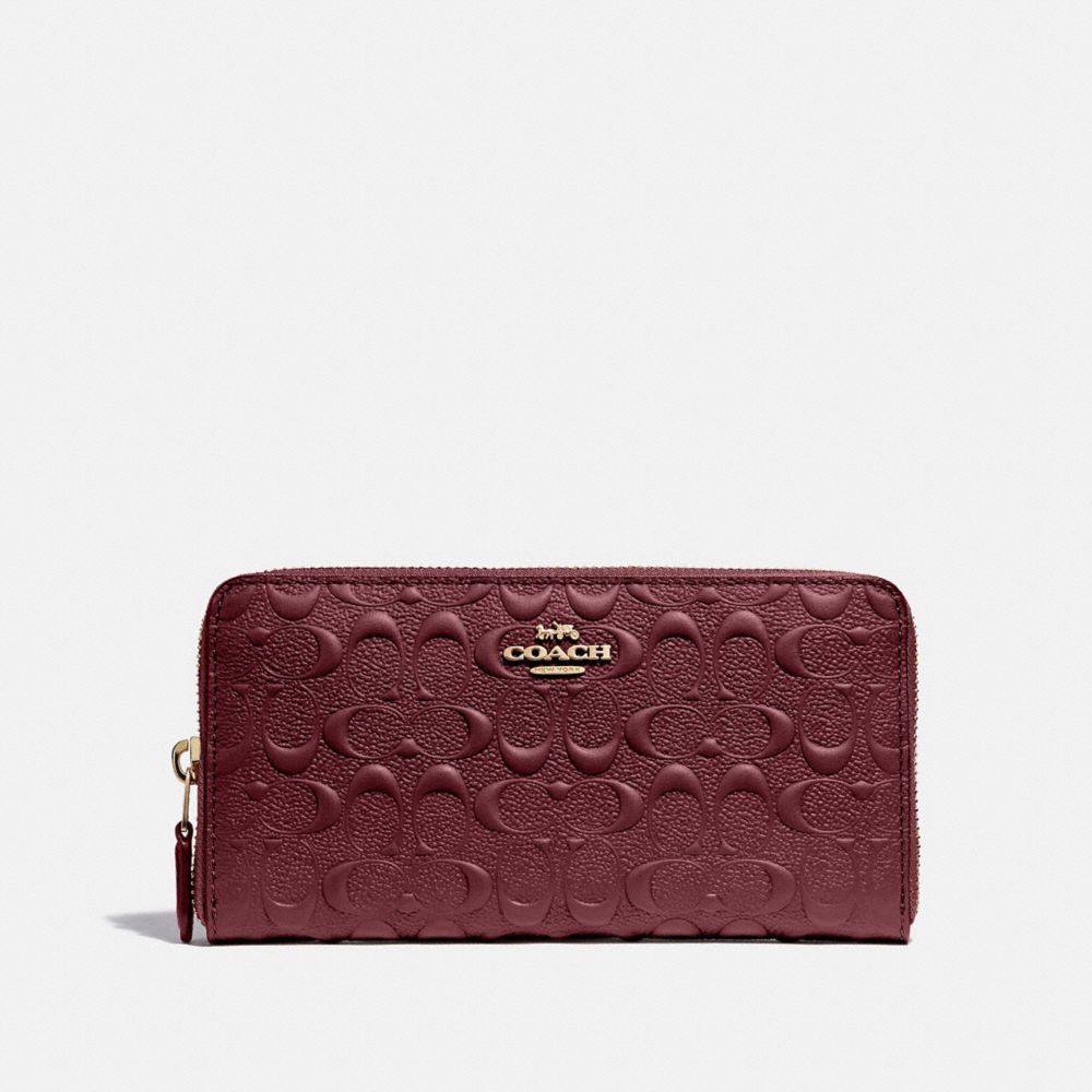 COACH®,ACCORDION ZIP WALLET IN SIGNATURE LEATHER,Leather,Gold/Wine,Front View