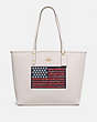 COACH®,REVERSIBLE CITY TOTE WITH AMERICANA FLAG MOTIF,pvc,Large,Gold/Chalk Multi Denim,Front View