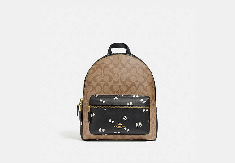 COACH®,DISNEY X COACH MEDIUM CHARLIE BACKPACK IN SIGNATURE CANVAS WITH SNOW WHITE AND THE SEVEN DWARFS EYES PRIN...,Gold/Khaki Multi,Front View