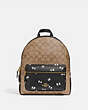 COACH®,DISNEY X COACH MEDIUM CHARLIE BACKPACK IN SIGNATURE CANVAS WITH SNOW WHITE AND THE SEVEN DWARFS EYES PRIN...,Gold/Khaki Multi,Front View