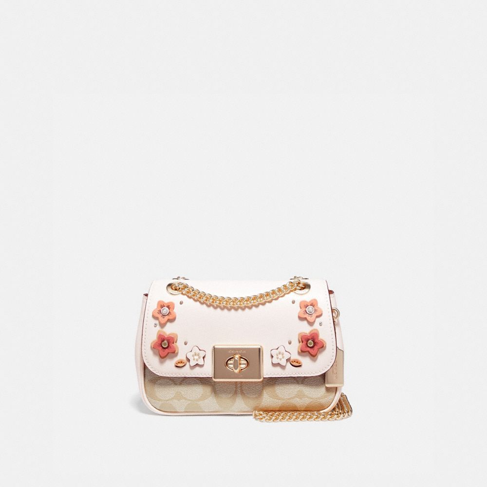 Coach bag with flower applique sale