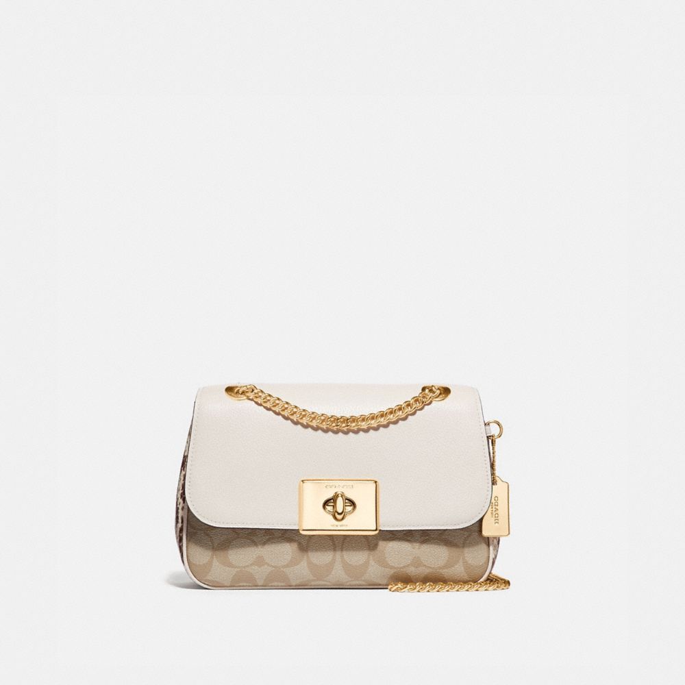 Mini cassidy crossbody in signature canvas sale