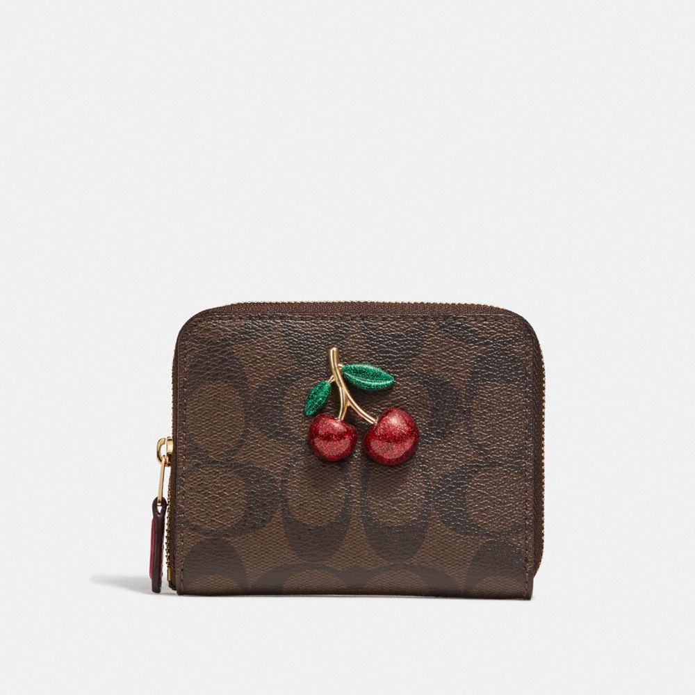 Small Zip Around Wallet In Signature Canvas With Fruit