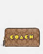 Accordion Zip Wallet In Signature Canvas With Pac Man Coach Print