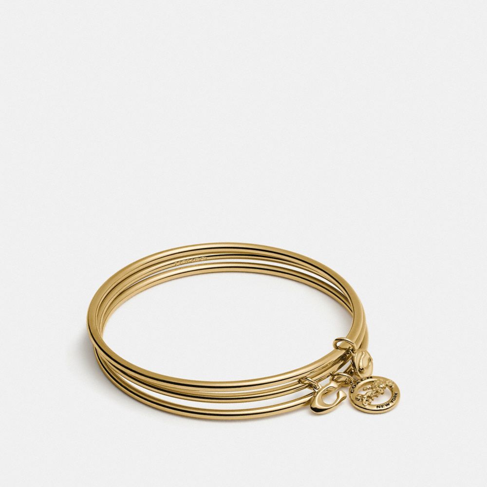 COACH®,HORSE AND CARRIAGE BANGLE SET,Gold/Chalk,Front View