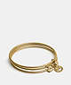 COACH®,HORSE AND CARRIAGE BANGLE SET,Metal,Gold/Chalk,Front View