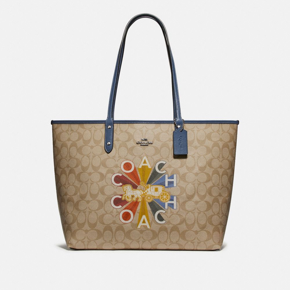 COACH®,REVERSIBLE CITY TOTE IN SIGNATURE CANVAS WITH COACH RADIAL RAINBOW,pvc,X-Large,Silver/Light Khaki Multi/Denim,Front View