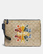 Large Wristlet 30 In Signature Canvas With Coach Radial Rainbow