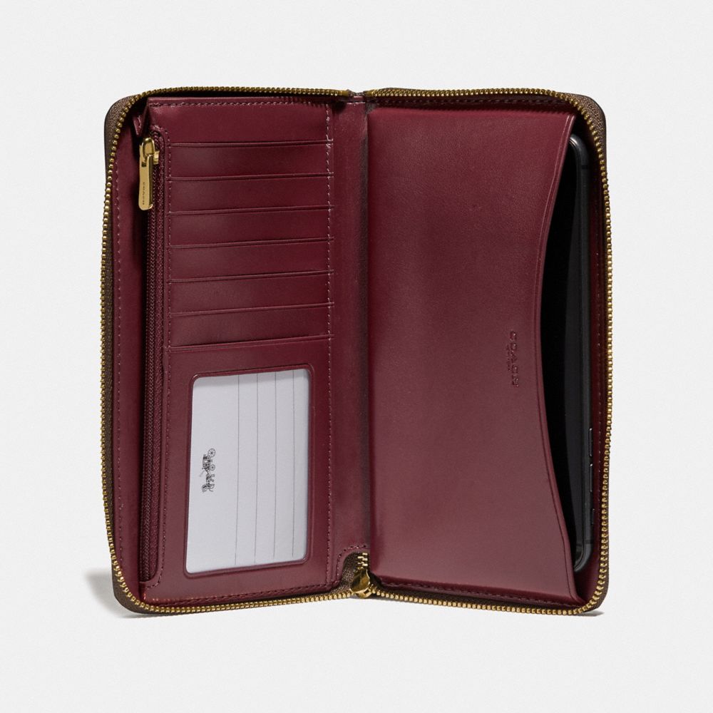 Large Phone Wallet In Signature Canvas With Prairie Daisy Cluster Print