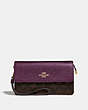 COACH®,FOLDOVER WRISTLET IN SIGNATURE CANVAS,Gold/Brown Metallic Berry,Front View