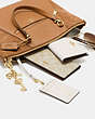 COACH®,PRAIRIE SATCHEL,Leather,Medium,Gold/Viridian,Angle View