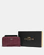 COACH®,BOXED LARGE PHONE WALLET IN SIGNATURE LEATHER,Leather,Silver/Wine,Front View