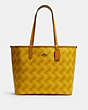COACH®,REVERSIBLE CITY TOTE WITH HORSE AND CARRIAGE PRINT,pvc,Large,Silver/Yellow Multi,Front View