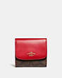 COACH®,SMALL WALLET IN SIGNATURE CANVAS,pvc,Gold/Brown True Red,Front View