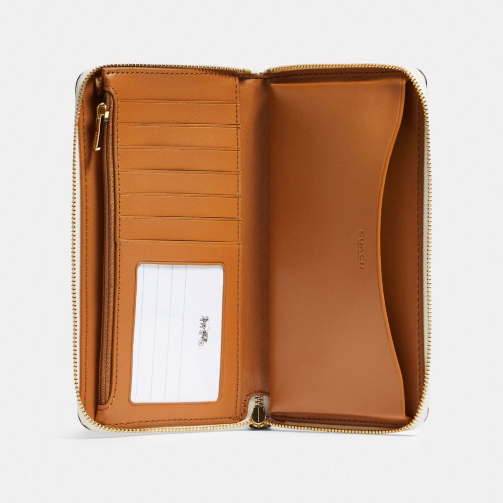 COACH®,Large Phone Wallet With Party Pig Print,,Inside View,Top View