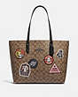 COACH®,STAR WARS X COACH TOWN TOTE IN SIGNATURE CANVAS WITH PATCHES,pvc,Large,Gunmetal/Khaki Multi,Front View