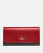 COACH®,TRIFOLD WALLET IN SIGNATURE CANVAS,pvc,Gold/Brown True Red,Front View