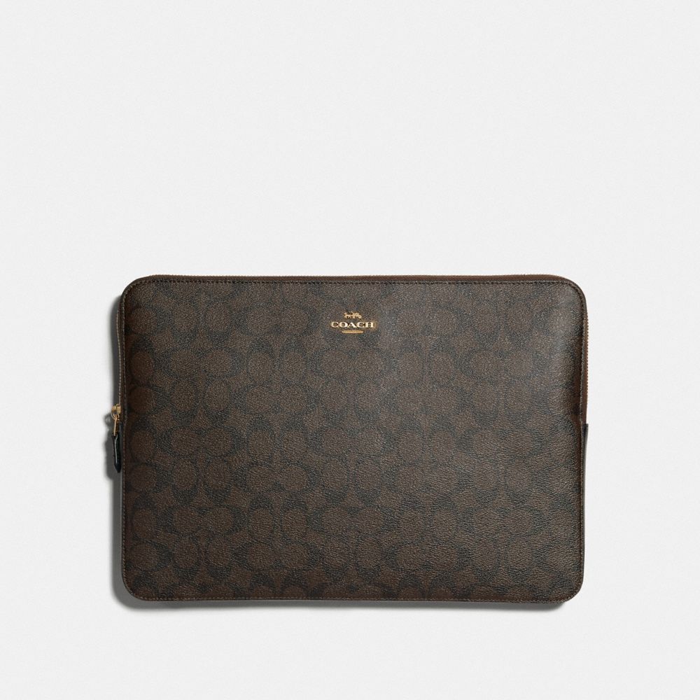 Coach leather best sale laptop sleeve